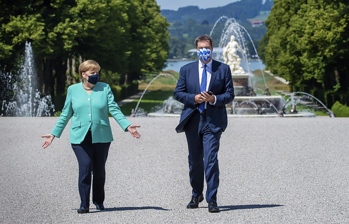 Меркель в "баварском Версале" провела переговоры с возможным преемником