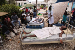 Число жертв землетрясения на Гаити возросло до 1419 человек