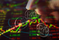 Рубль и акции перешли к снижению на новостях о военной эскалации в Донбассе