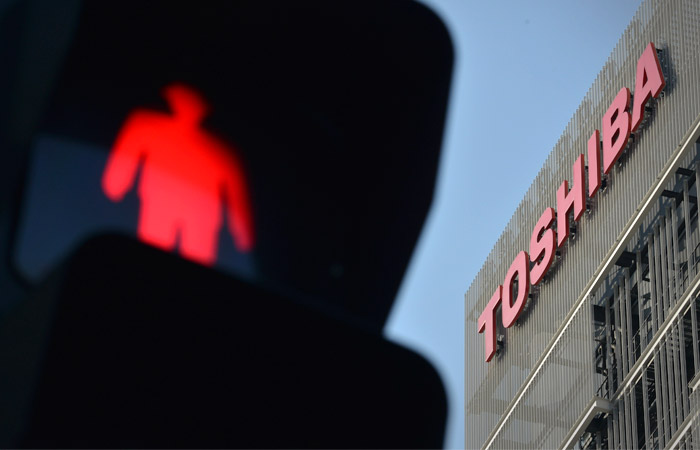 Toshiba приостановила инвестиции в РФ