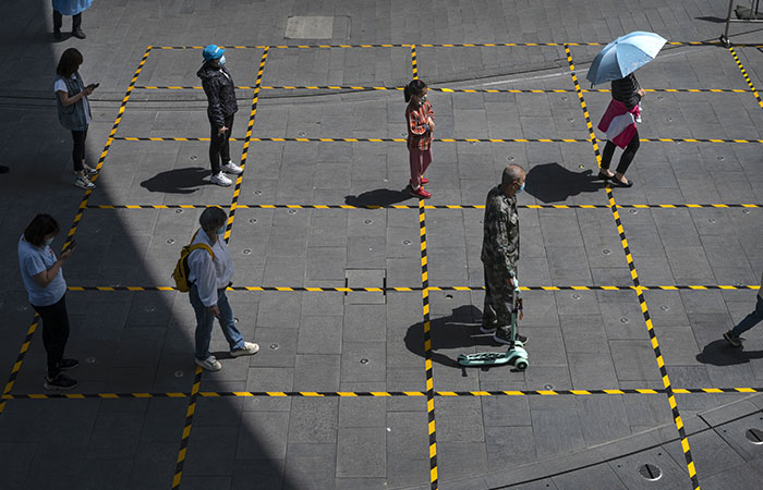 В Пекине и Гонконге смягчили ковид-ограничения