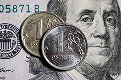 Рубль завершил торги четверга почти без изменений к доллару и евро