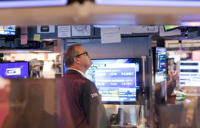 Dow Jones и S&P 500 в пятницу выросли и обновили рекорды, Nasdaq снизился