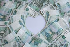 Рубль немного укрепляется относительно доллара и юаня на фоне дорожающей нефти