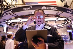 Фондовые индексы США завершили торги ростом на заявлениях Пауэлла