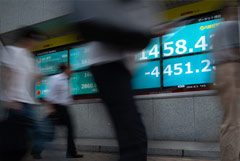 Nikkei 225 взлетел на 10% после падения днем ранее